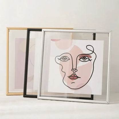 Silver metallic hangable picture frame with minimalist black mademoiselle line-art and pink red accents for bedroom art