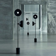 Black circular DecorBites™ Marble LED floor light with funnel shade and matte finish for modern living rooms 220v-240v