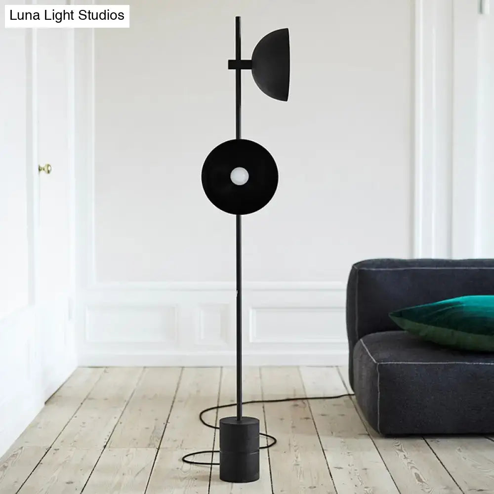 Black minimalist DecorBites™ marble LED floor light with sleek funnel shade and cylindrical base for modern living rooms 220v-240v