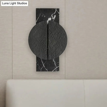 Minimalist black marble wall lamp with textured circular disc and white veining for living space 110v-120v 220v-240v use
