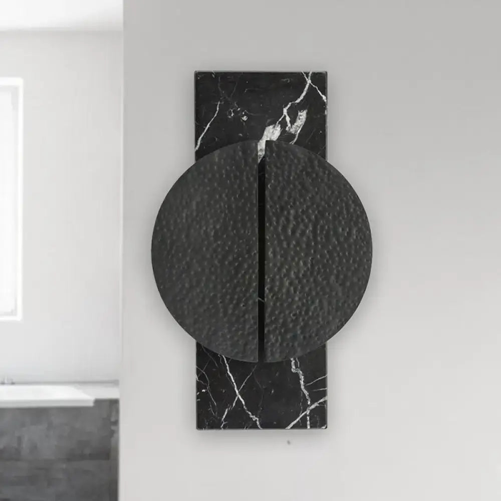 Minimalist black marble wall lamp with textured circular disc and vertical seam for living space 110v-120v 220v-240v use
