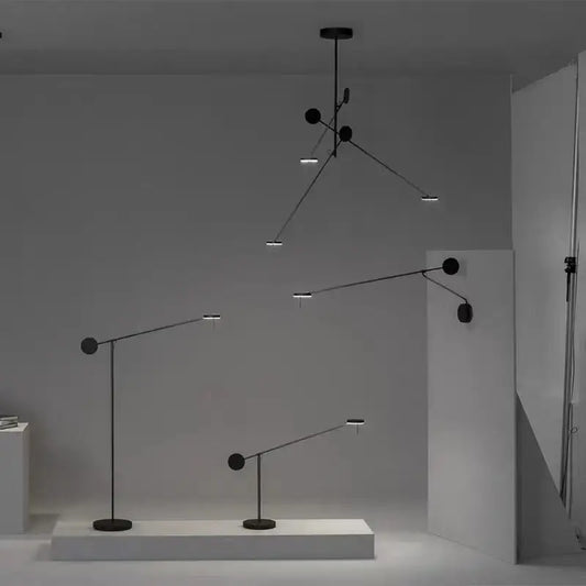 Minimalist black metal pendant light and wall-mounted led fixtures with articulated arms for living room decorbites black metal