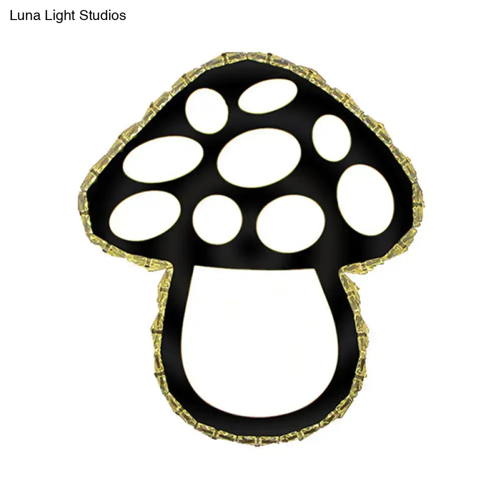 Minimalist black mushroom led wall sconce with gold-trimmed edges and white spots for bedroom accent lighting