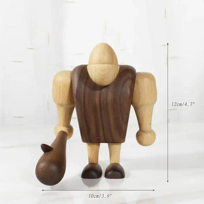 A minimalist wood carving figurine with light body and dark brown vest holding a matching jug for living room decor