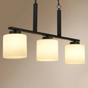 DecorBites minimalist opal frosted glass island lighting fixture with black metal frame and three cylindrical shades
