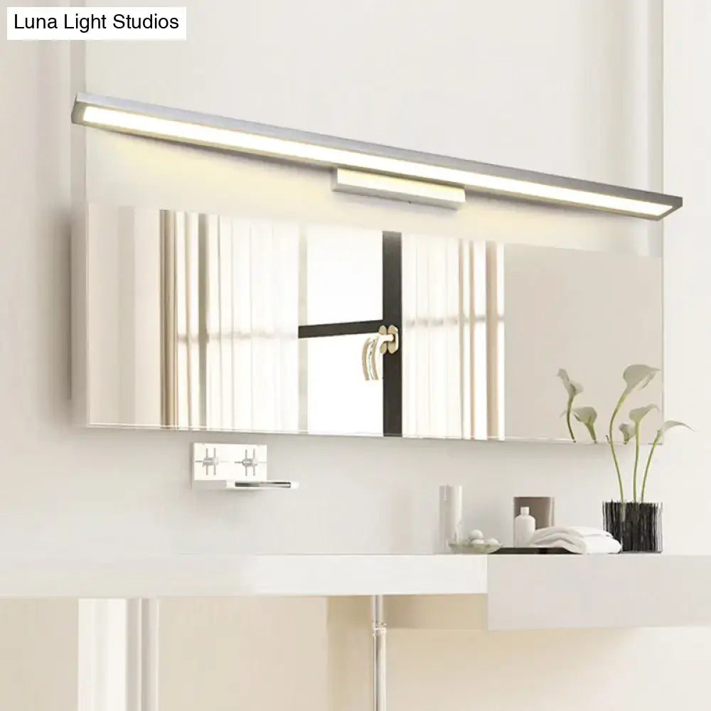Modern rectangular bathroom vanity lamp with sleek silver frame and integrated LED lighting for minimalist bathroom vanity