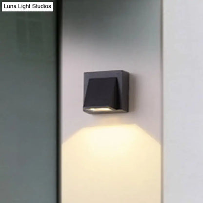Black square minimalist triangle aluminum flush wall lamp with sleek design and warm ambient lighting for corridors