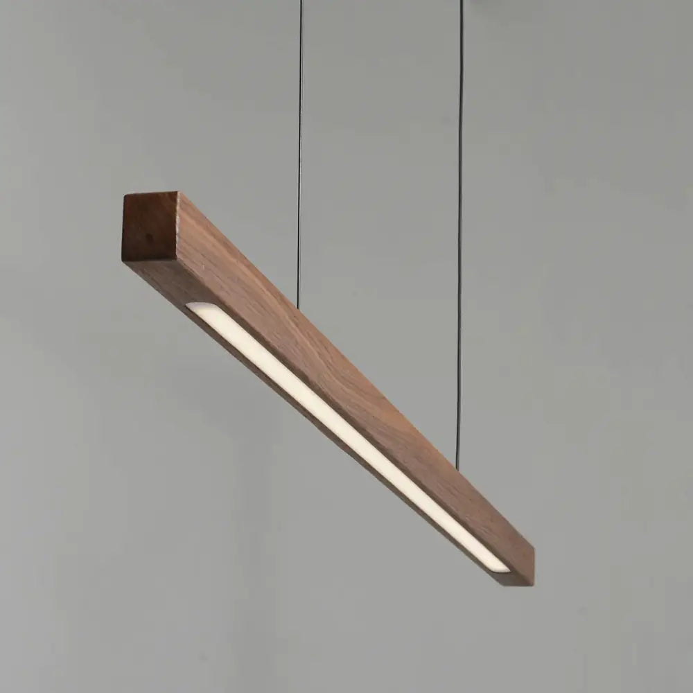 Minimalist black walnut log pendant light with integrated led strip and warm wood finish for dining room decorbites black walnut