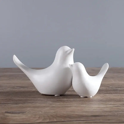 Minimalist black and white ceramic bird figurine set with smooth glossy surfaces for living room decor