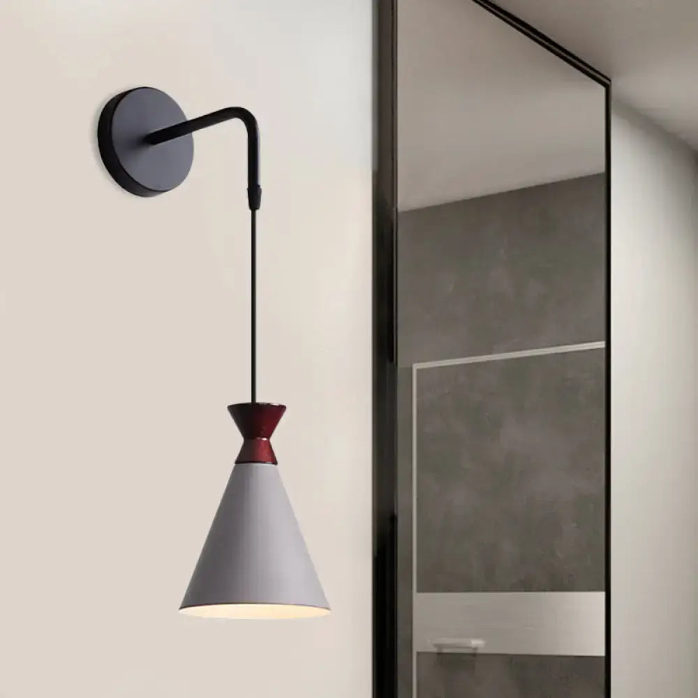 A minimalist black iron conical wall light with a gray lampshade and red band for bedroom use wall light