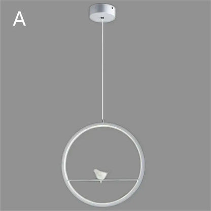 Modern white circular led ring pendant light with a small bird figurine in minimalist decorbites bird chandelier design