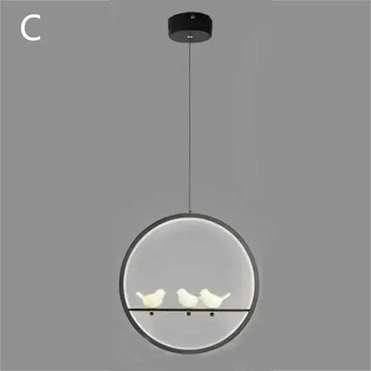 Modern circular pendant light with black frame and three white ceramic birds in decorbites bird chandelier design