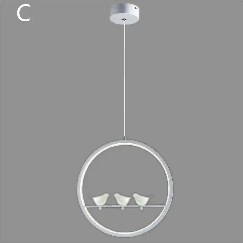 Modern white circular pendant light with three small bird figurines for minimalist black and white decorbites bird chandelier