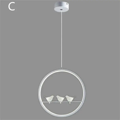 Modern white circular pendant light with three small bird figurines for minimalist black and white decorbites bird chandelier
