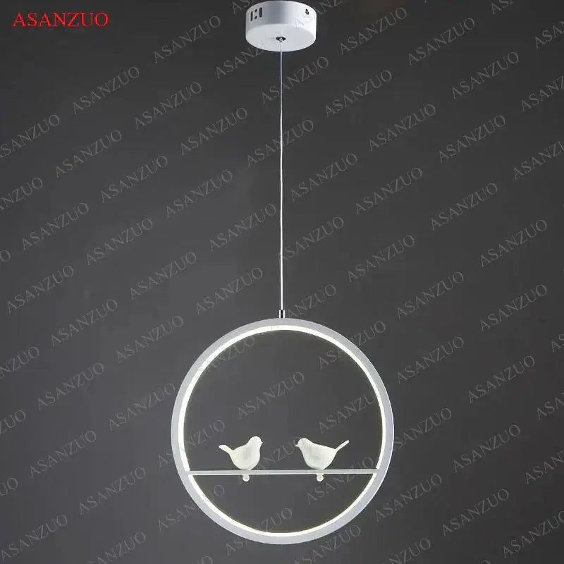 White circular led pendant light featuring two small bird figurines on a bar in minimalist decorbites bird chandelier