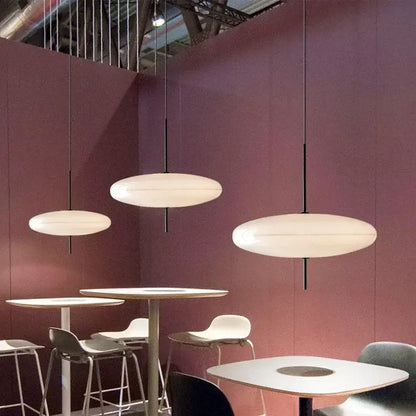 Modern white oval pendant light with sleek black cords by decorbites designer pendant light for dining room decor