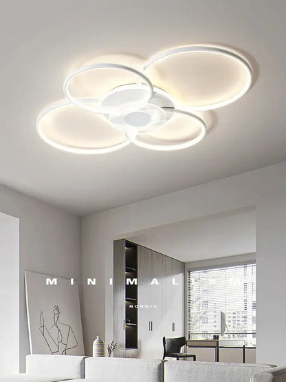Modern white led ceiling lamp with overlapping circular rings and minimalist design for decorbites living room ceiling