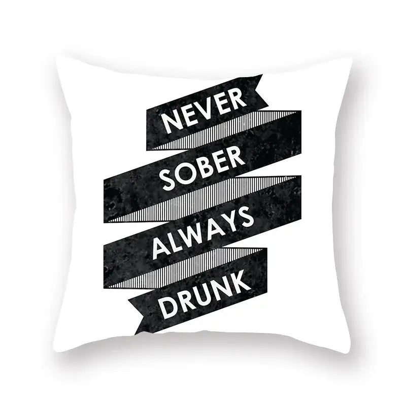 White throw pillow with bold black ribbon and never sober always drunk text featuring decorbites black geometric cushion cover