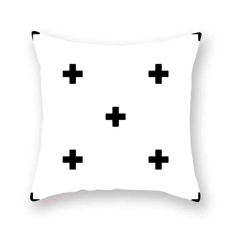 White throw pillow with minimalist black geometric cushion cover featuring five bold plus signs for living room decorbites black geometric style