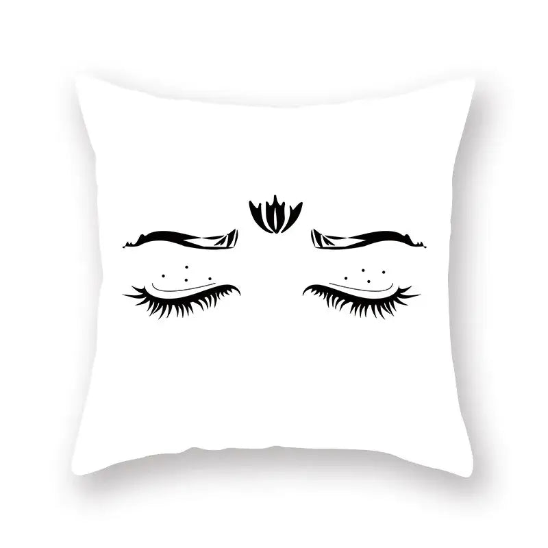 White square geometric cushion cover with black minimalist closed eyes and lotus flower decorbites black geometric design