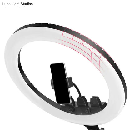 Minimalist black and white led ring light with phone mount and red grid lines featuring adjustable color temperature