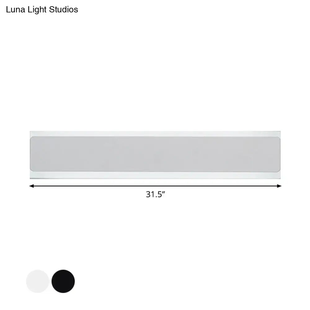 Minimalist 31.5-inch rectangular led wall lamp with sleek design available in black or white finishes for bedroom use