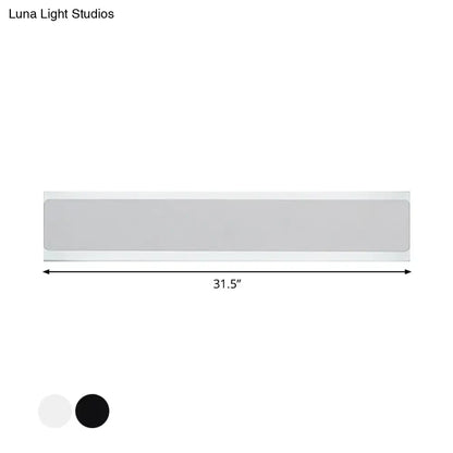 Minimalist 31.5-inch rectangular led wall lamp with sleek design available in black or white finishes for bedroom use