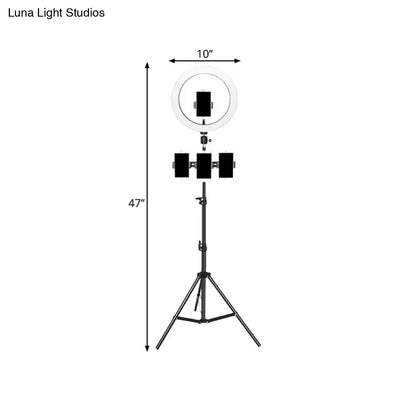 Black tripod-mounted ring light with three rectangular panels and luna light studios branding for mobile phone holder use