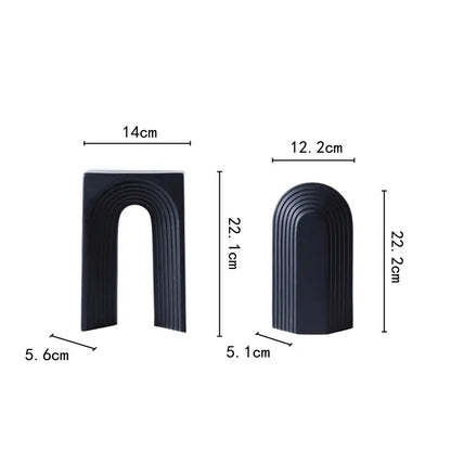 Two matte black ceramic semicircular arch bookends with vertical ridges for minimalist living room decorbites geometric ceramic decor figurines