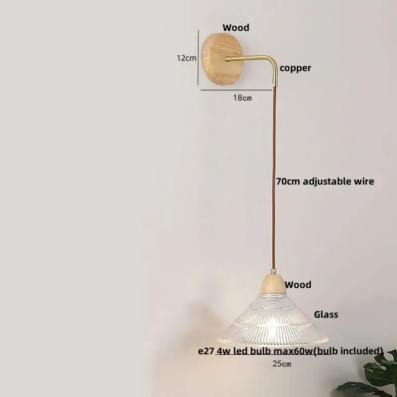 Minimalist wall light with natural wood base copper arm and decorbites clear glass shade for bedroom lighting