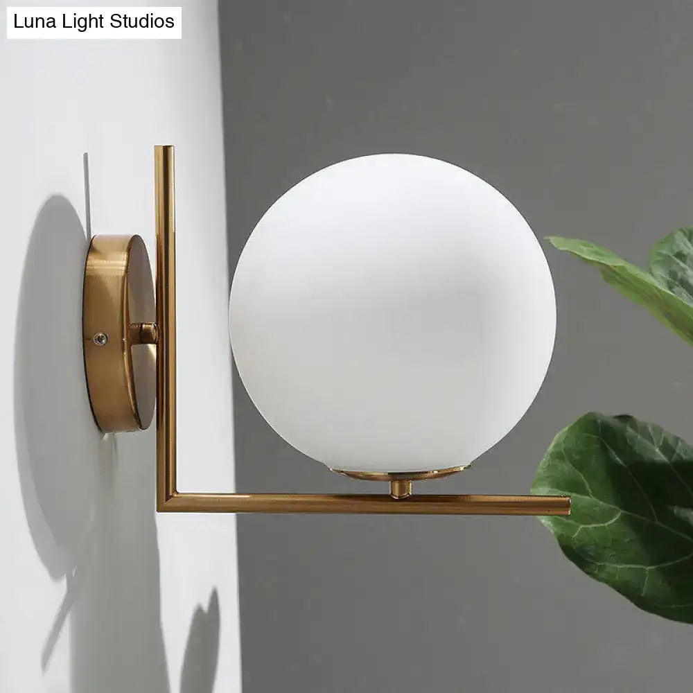 Minimalist brass angle arm wall sconce with opaline glass frosted globe for bedroom e12 e14 lighting