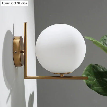 Minimalist brass angle arm wall sconce with opaline glass frosted globe for bedroom e12 e14 lighting