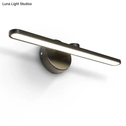 Modern brushed bronze wall light with a sleek elongated rectangular LED bar for minimalist bathroom sconce fixture