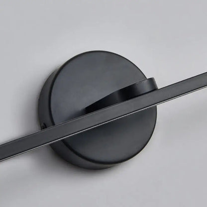 Minimalist black matte wall light with brass elliptical design for bathroom sconce fixture and modern decor