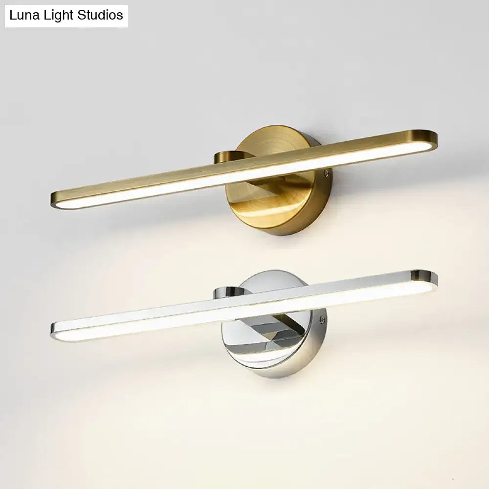 Minimalist brass elliptical wall light featuring a sleek elongated led light bar on a circular base for bathroom use