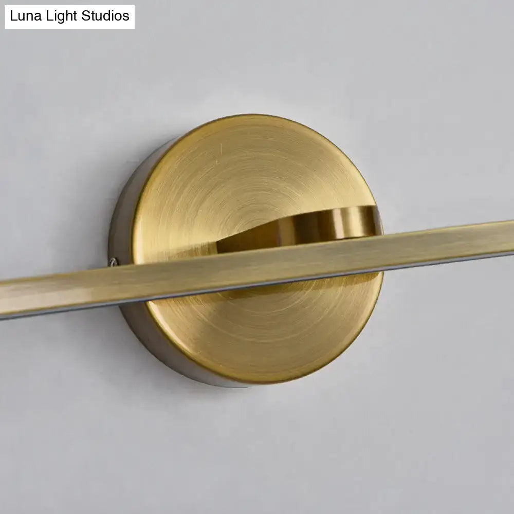 Minimalist brass elliptical wall light with brass finish and sleek design for bathroom sconce fixture