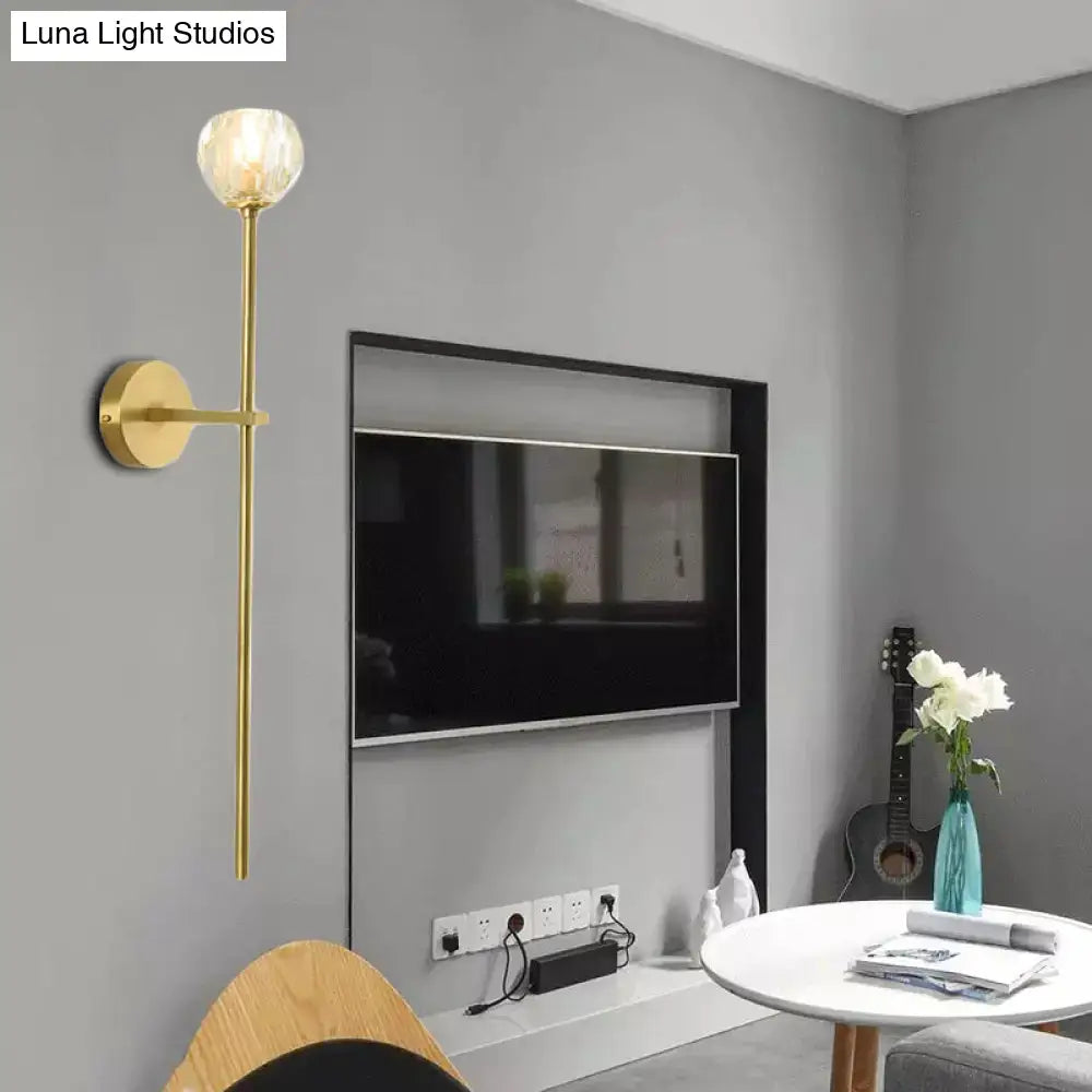 Minimalist brass wall sconce in gold tone with faceted crystal spherical globe direct wired in two sizes for bedroom light