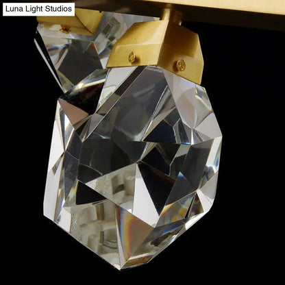 Clear faceted crystal pendant with gold-toned metal cap in minimalist brass led gemstone dining room ceiling light