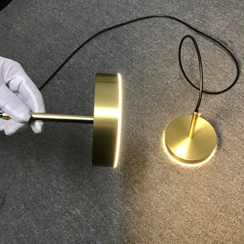 Minimalist brass led pendant light with gold finish and cylindrical shade for dining room by decorbites brass led pendant
