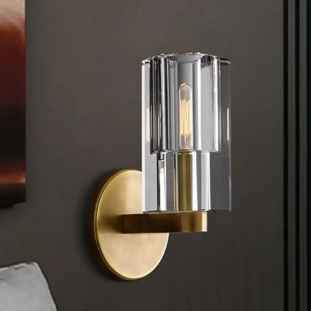 Minimalist brass wall sconce with bulb base features vertically ribbed glass shade for living room lighting type
