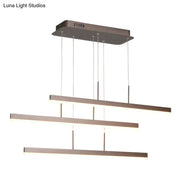 Minimalist bronze acrylic 3 tiered pendant light with sleek horizontal bars for dining room illumination