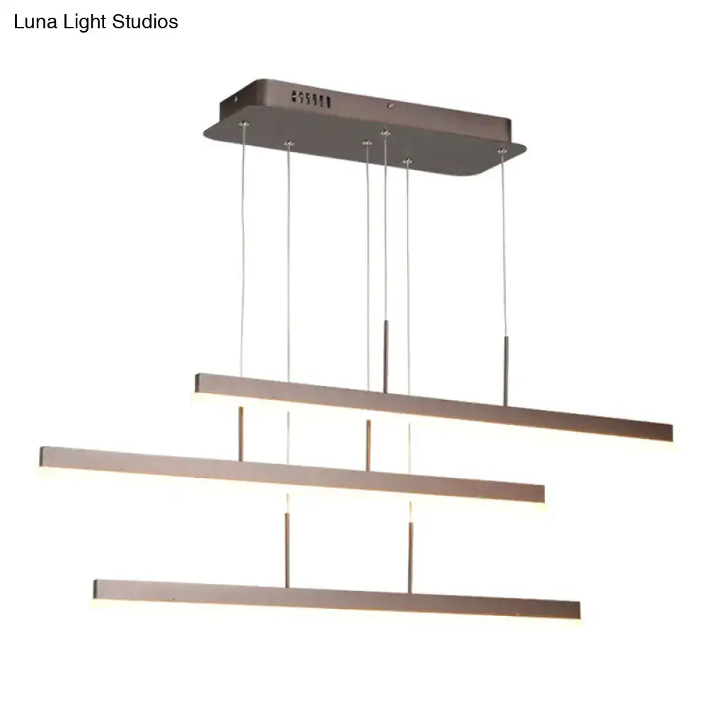 Minimalist bronze acrylic 3 tiered pendant light with sleek horizontal bars for dining room illumination