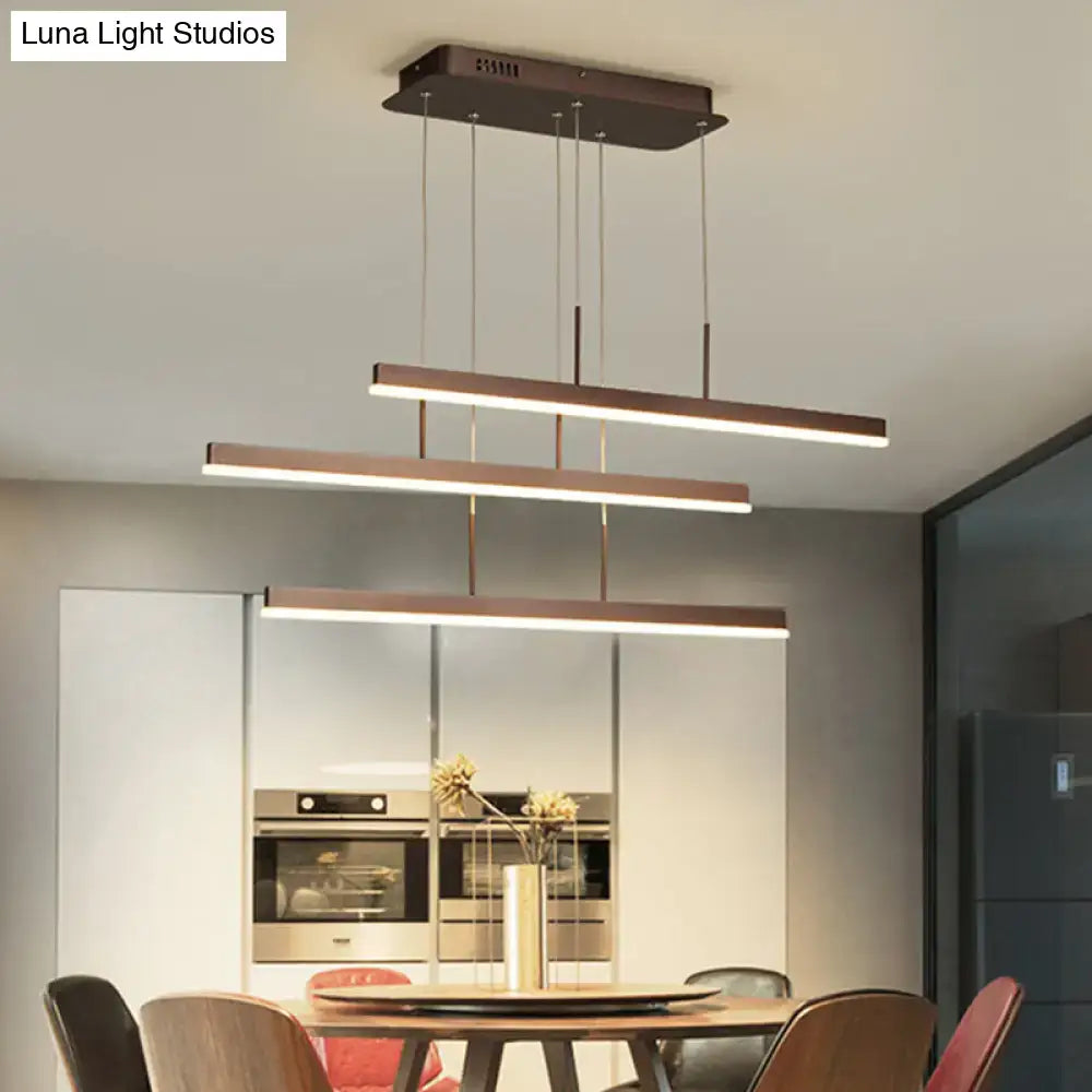 Minimalist bronze acrylic pendant light with three tiered horizontal bars for dining room lighting