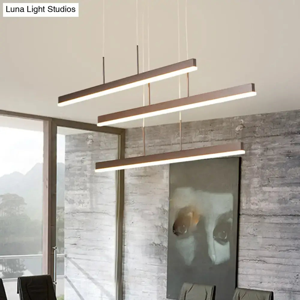 Minimalist bronze acrylic 3 tiered pendant light with sleek rectangular design and warm white led for dining room