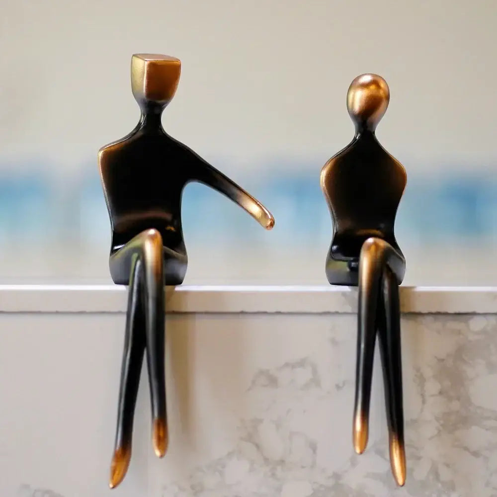 Two minimalist bronze resin couple sculptures with glossy finish for bedroom decorbites elegant resin decor