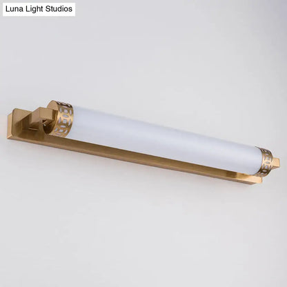 Minimalist bronze greek key wall light sconce with gold finish frosted glass cylinder and ornate decorative bands for bathroom vanity