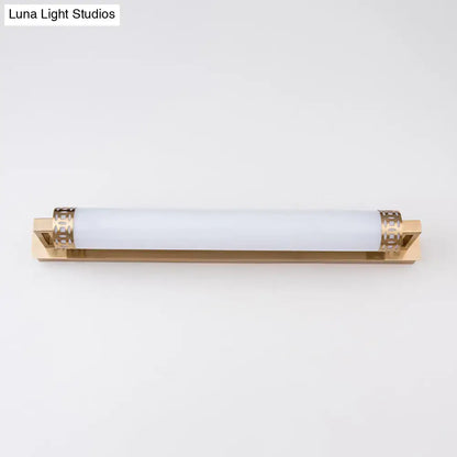 Minimalist bronze greek key wall light sconce with gold finish and frosted glass cylinder for bathroom vanity