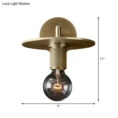 Decorbites™ minimalist bronze wall sconce with brass finish textured stem and dark amber glass shade light bulb