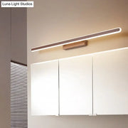 Minimalist brown led vanity wall light with sleek rectangular design warm white illumination and matte wood-finish bracket