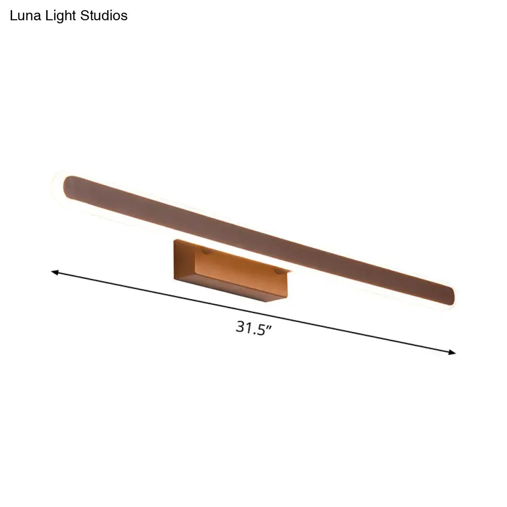 A sleek 31.5-inch matte bronze minimalist rectangular led vanity wall light for modern bathroom use
